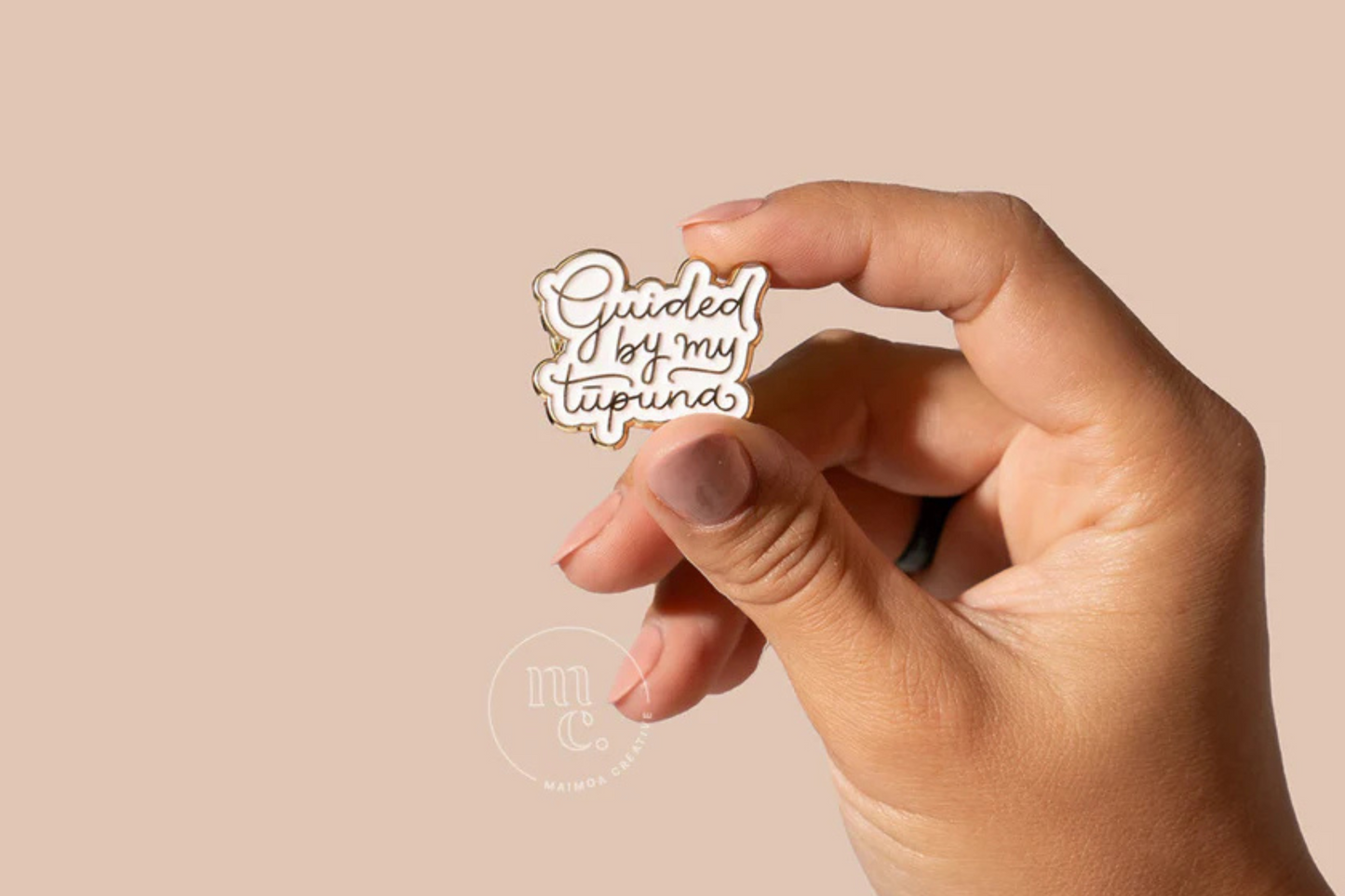 GUIDED BY ENAMEL PIN.