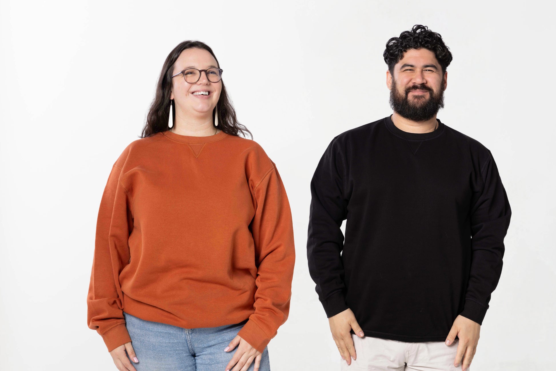 Models wearing the Subtly Sarcastic premium blank range – unisex, Māori-inspired cotton/polyester hoodie for everyday NZ wear.