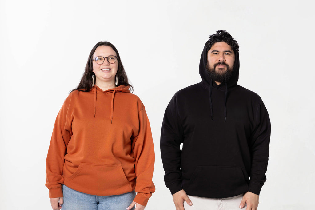Models wearing Blank Hoodie – unisex, Māori-inspired cotton/polyester hoodie for everyday NZ wear.