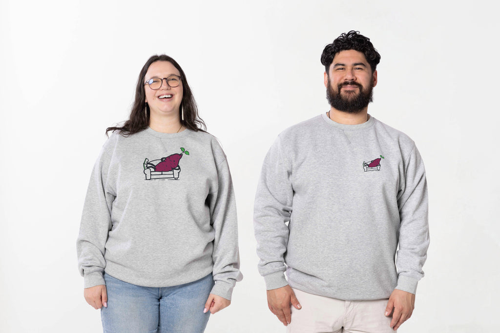Models wearing the Couch Kūmaru crewneck – unisex, Māori-inspired cotton/polyester hoodie for everyday NZ wear.