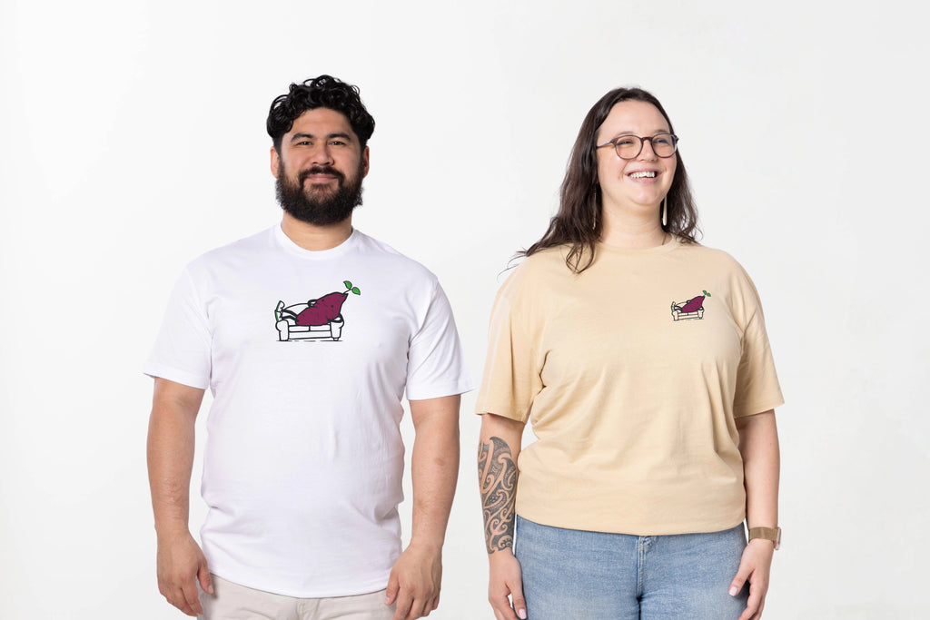 Models wearing the Couch Kumara Tee – unisex, Māori-inspired cotton T-shirt for everyday NZ wear.