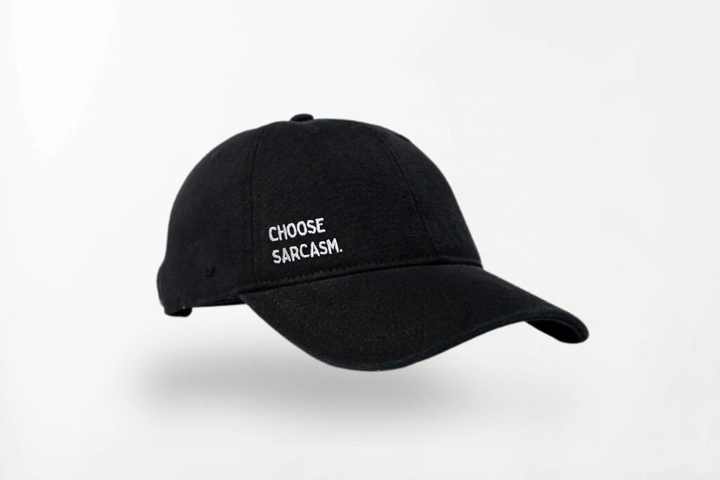 Flat lay of the CHOOSE SARCASM cotton canvas cap – 100% heavy cotton canvas, unisex, one size fits all.