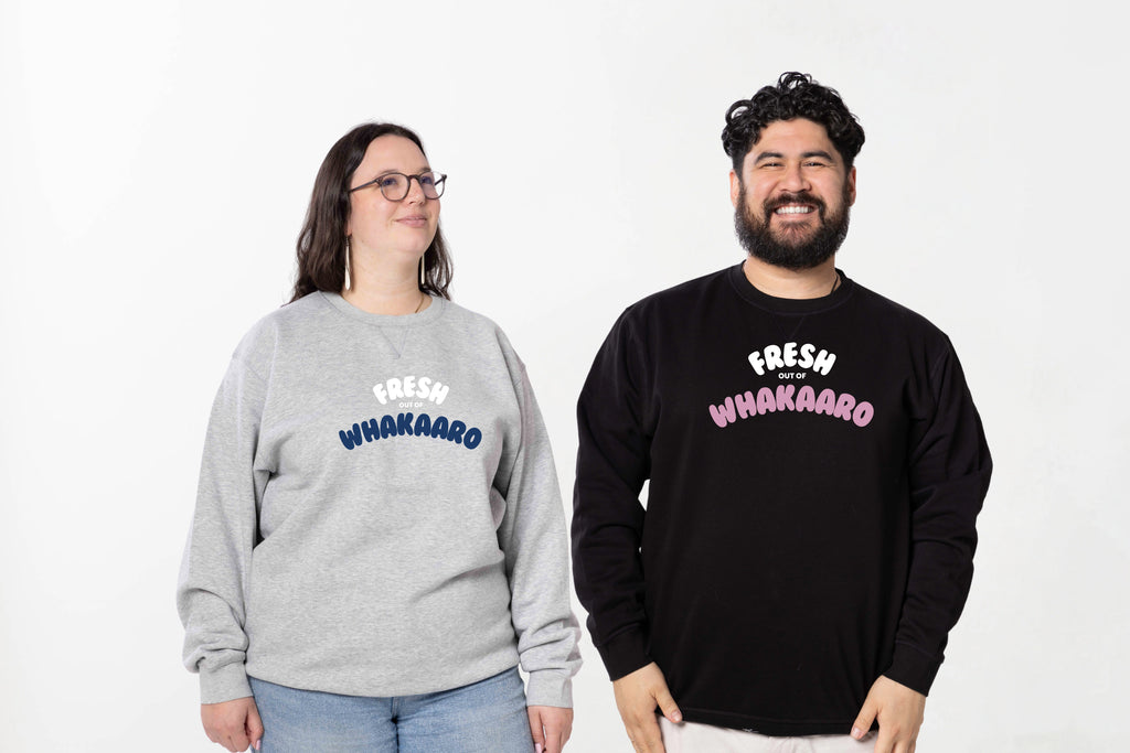 Models wearing the Fresh out of Whakaaro crewneck – unisex, Māori-inspired cotton/polyester crewneck for everyday NZ wear.