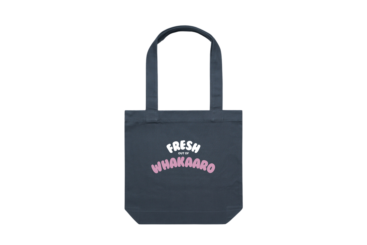 Flat lay of the FRESH OUT OF WHAKAARO tote bag, part of our Māori clothing and accessories for women and men.