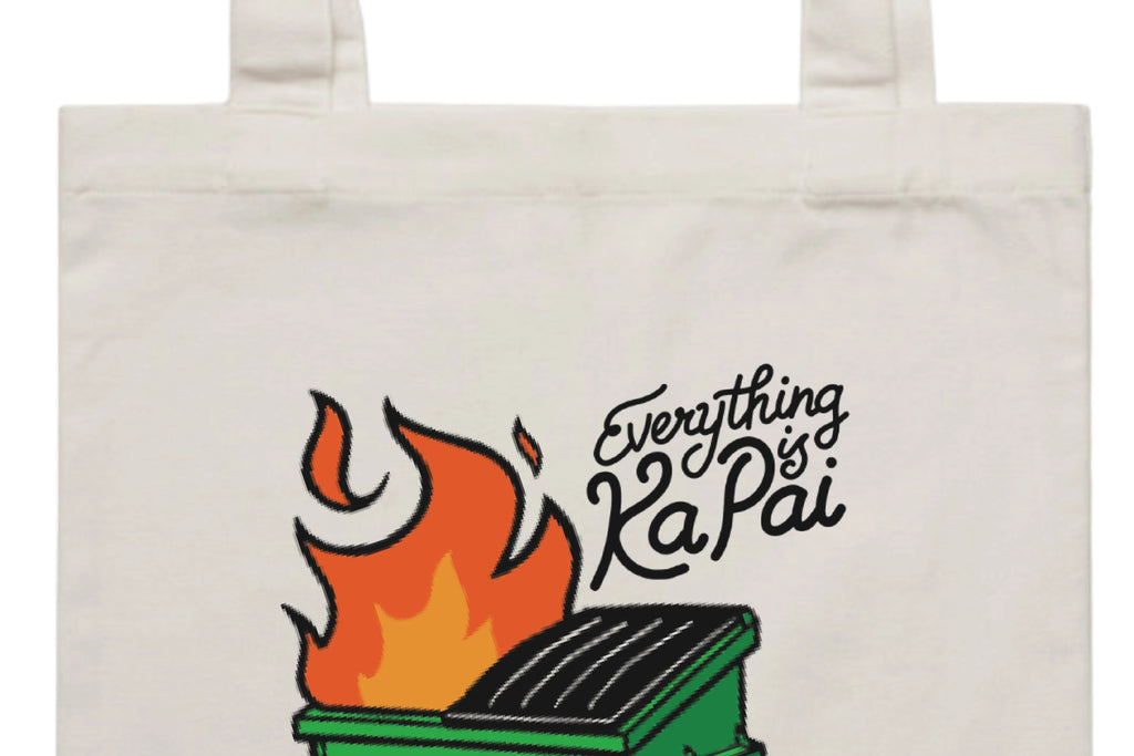 Flat lay of the Everything is Ka Pai Tote Bag – durable, eco-friendly, and designed for everyday errands or mahi. Perfect for carrying kai, gear, or your mental baggage.