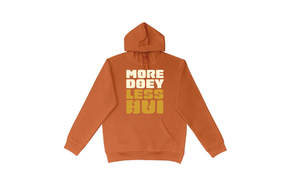Flat lay of the MORE DOEY, LESS HUI hoodie in copper (orange) with orange text, part of our Māori men's and women's clothing NZ collection.