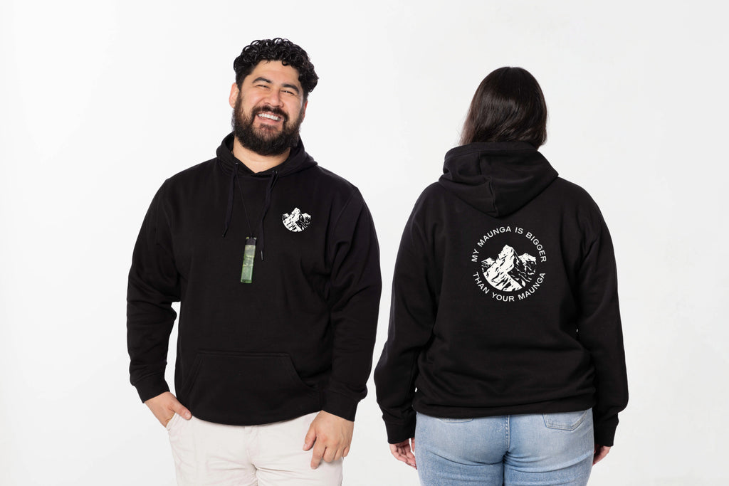 Models wearing the Maunga Hoodie – unisex, Māori-inspired cotton/polyester hoodie for everyday NZ wear.