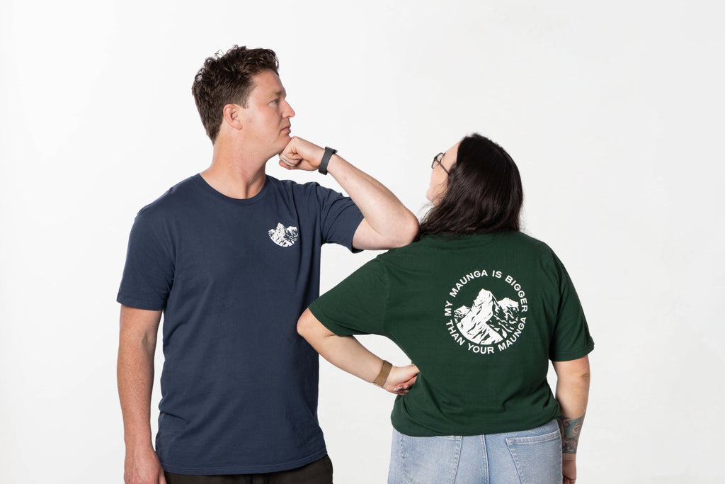 Models wearing the My Maunga is bigger than your Maunga Tee – unisex, Māori-inspired cotton T-shirt for everyday NZ wear.